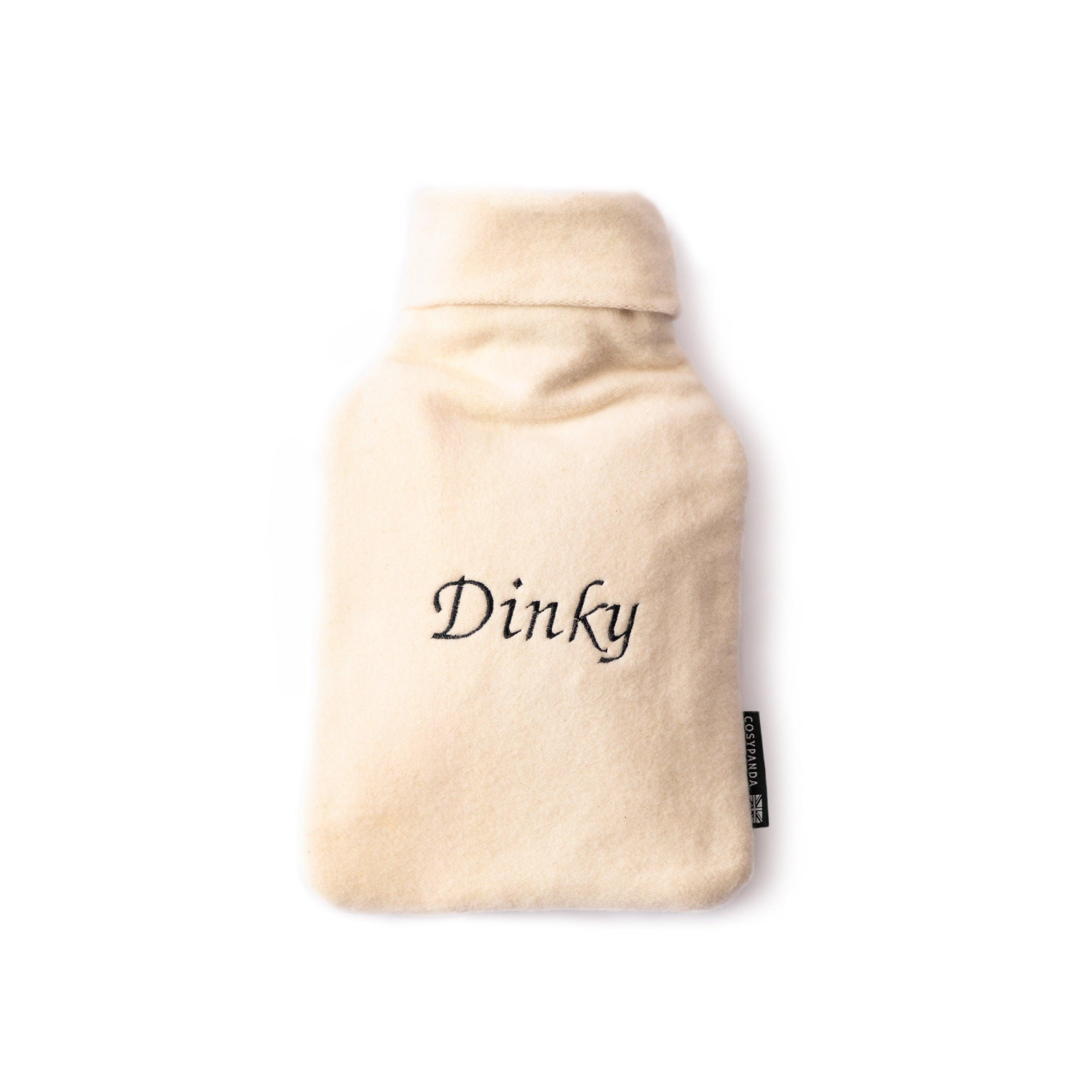 A cozy personalised hot water bottle cover made from bamboo and organic cotton, featuring embroidered names and initials, perfect for warmth and comfort.