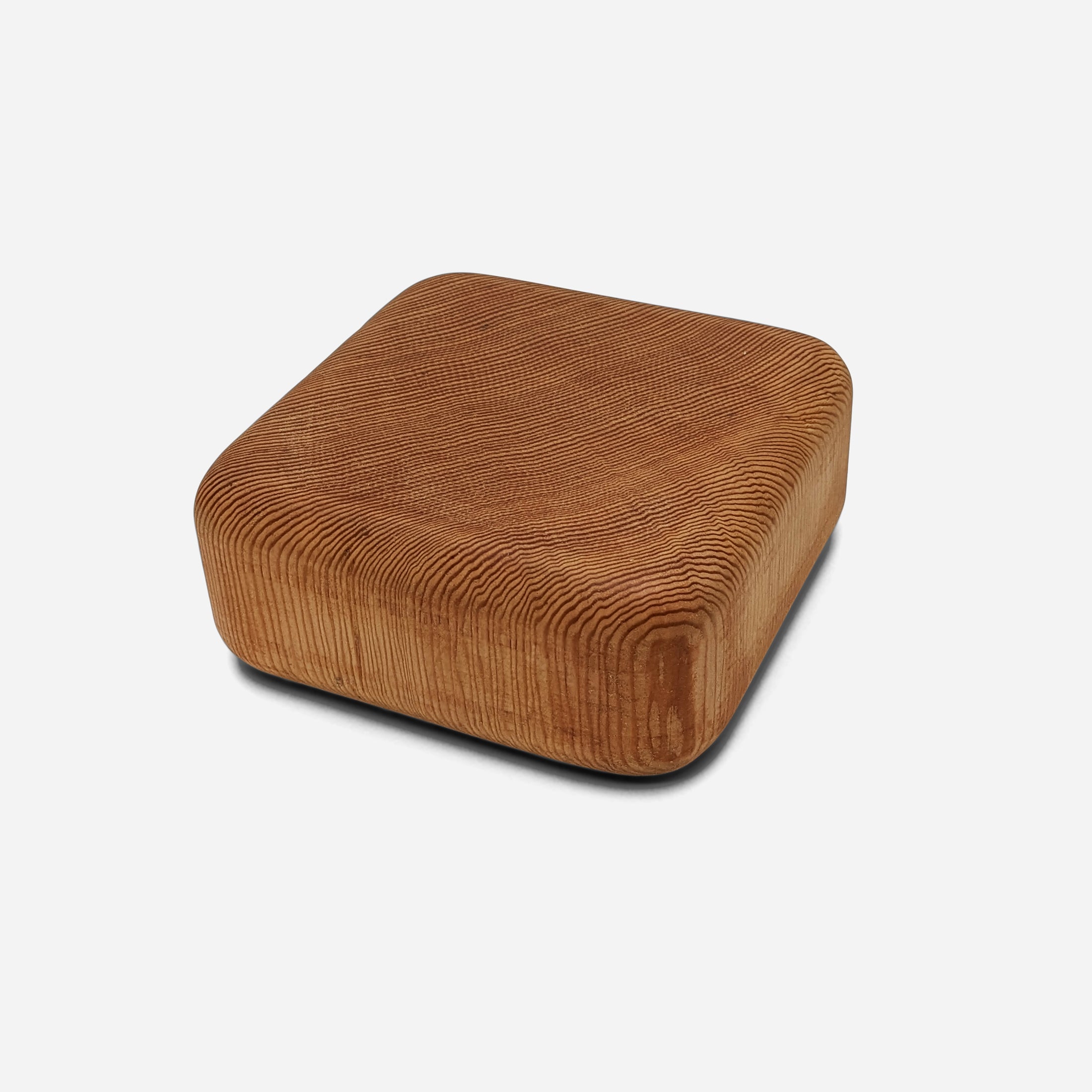 Elegant Pillow Trivet made from Doug Fir wood with soft edges, perfect for protecting surfaces while serving hot dishes.