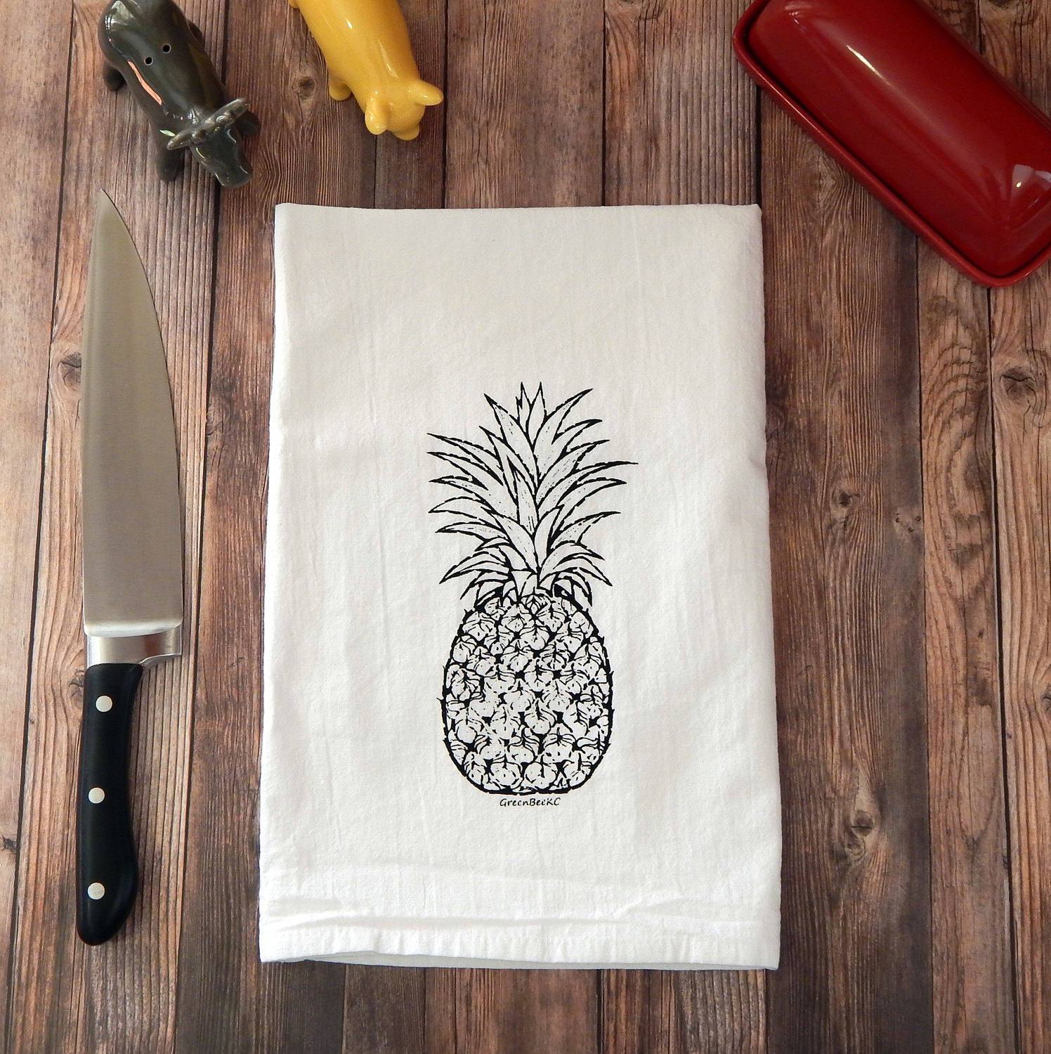 Pineapple Hospitality Flour Sack Tea Towel, hand-printed on 100% cotton, featuring a white background and a hanging loop.