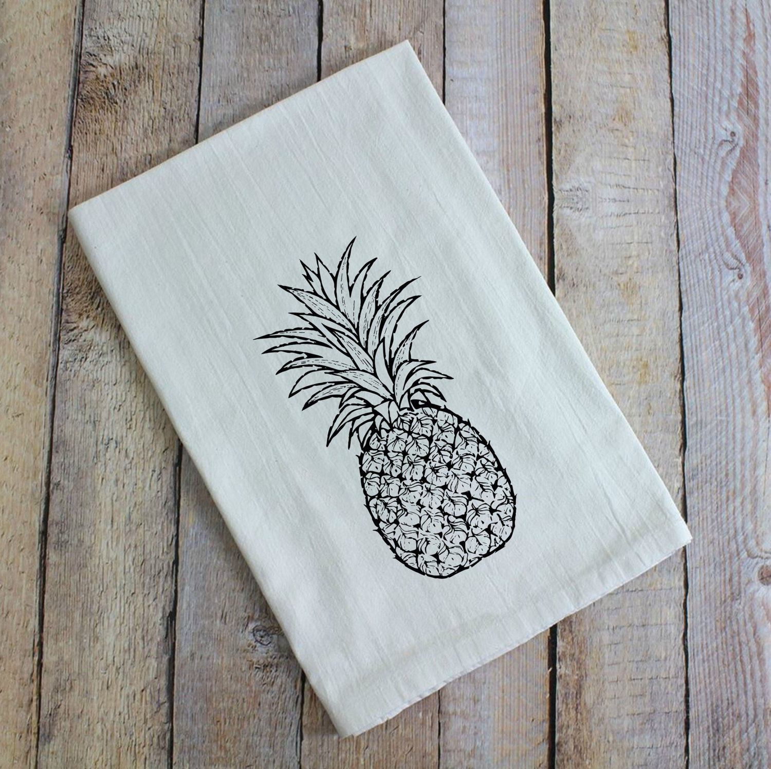 Pineapple Hospitality Flour Sack Tea Towel, hand-printed on 100% cotton, featuring a white background and a hanging loop.