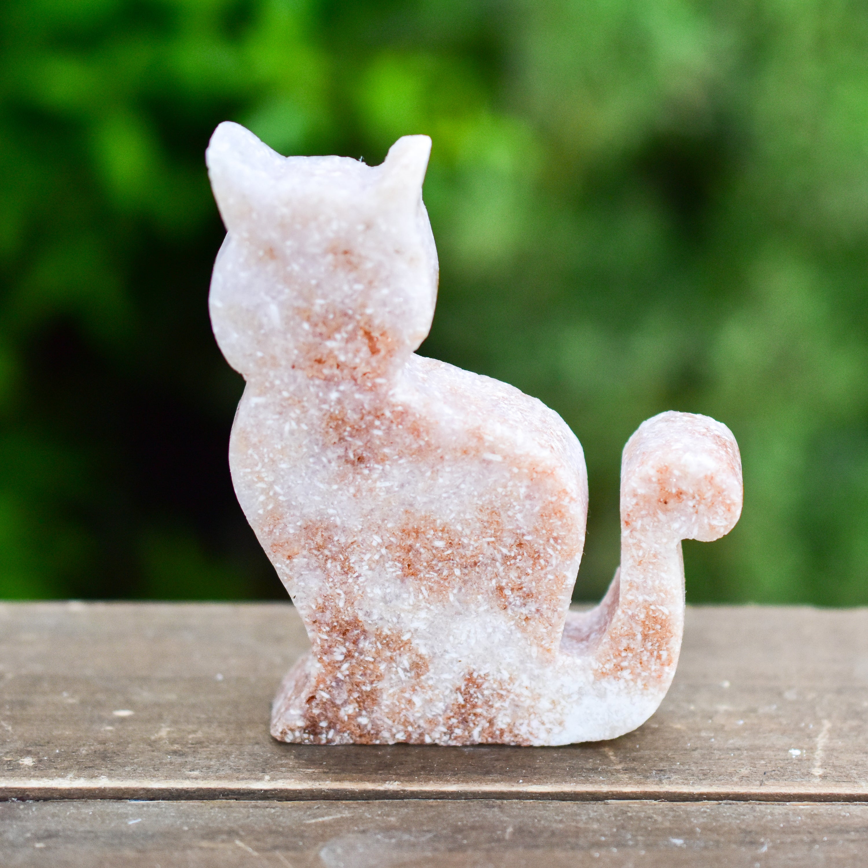 Two hand-crafted Pink Amethyst Sitting Cats, showcasing their unique colors and polished finish, perfect for home decor.