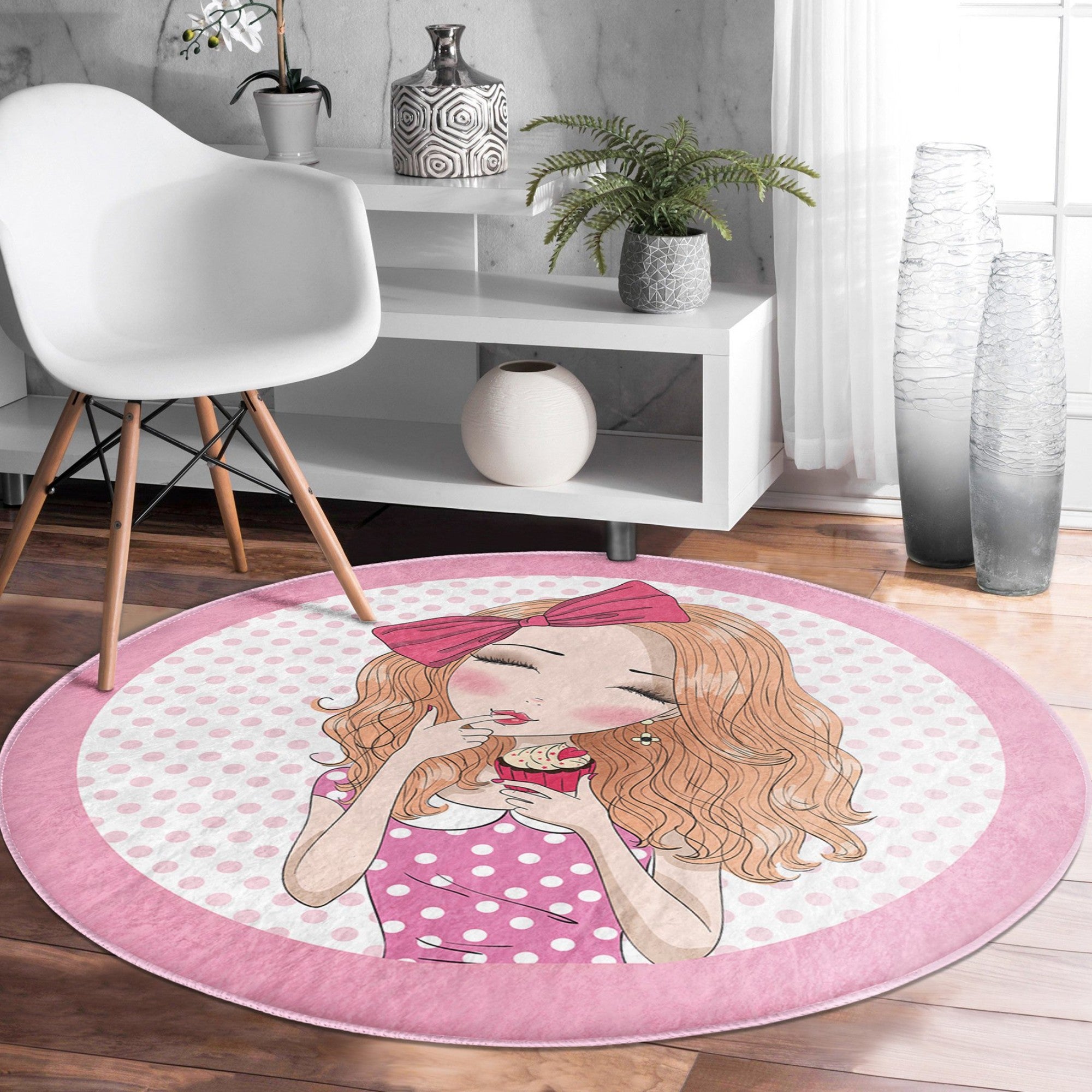 A vibrant pink round rug designed for girls' rooms, showcasing soft velvet fabric and a playful design, perfect for playrooms and bedrooms.