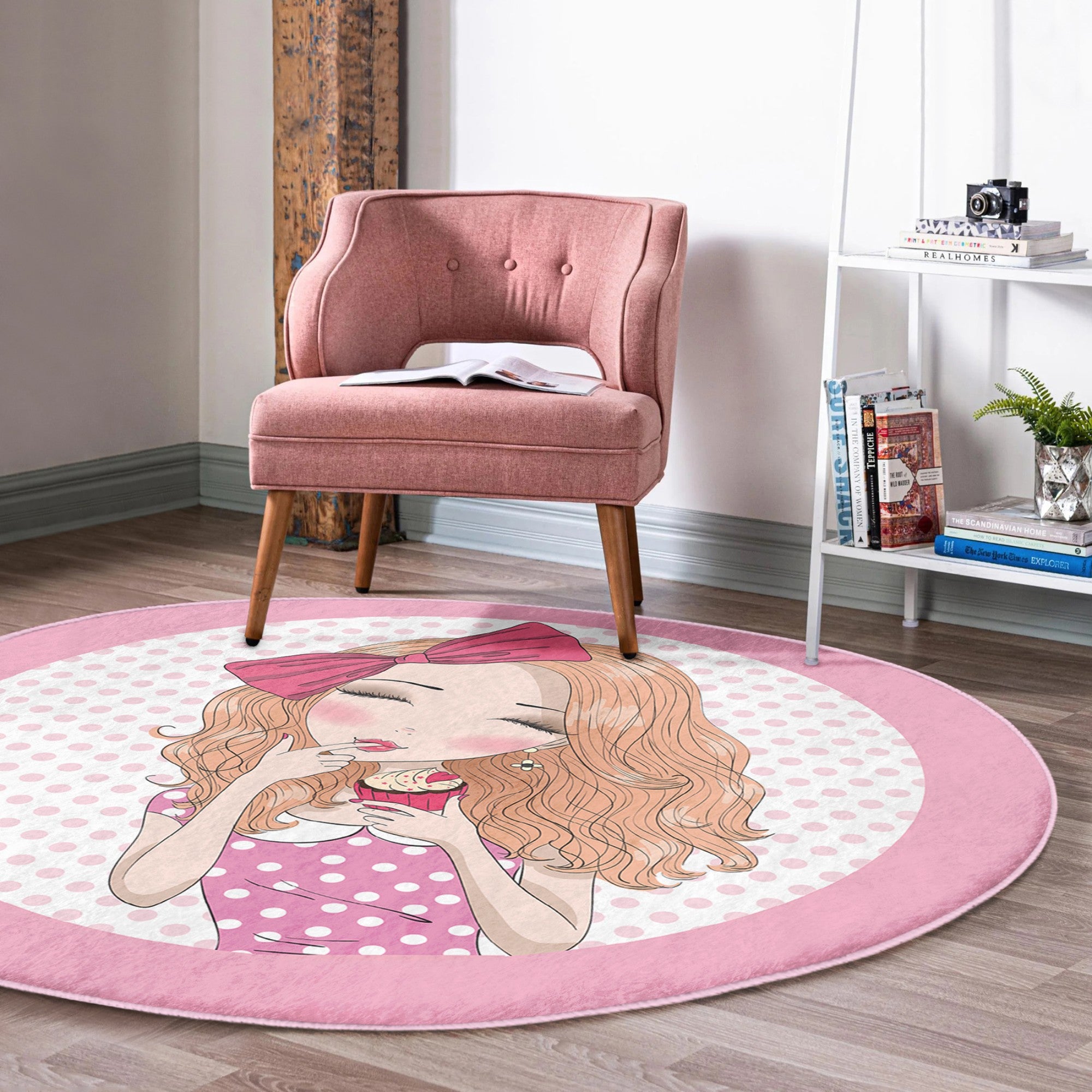 A vibrant pink round rug designed for girls' rooms, showcasing soft velvet fabric and a playful design, perfect for playrooms and bedrooms.