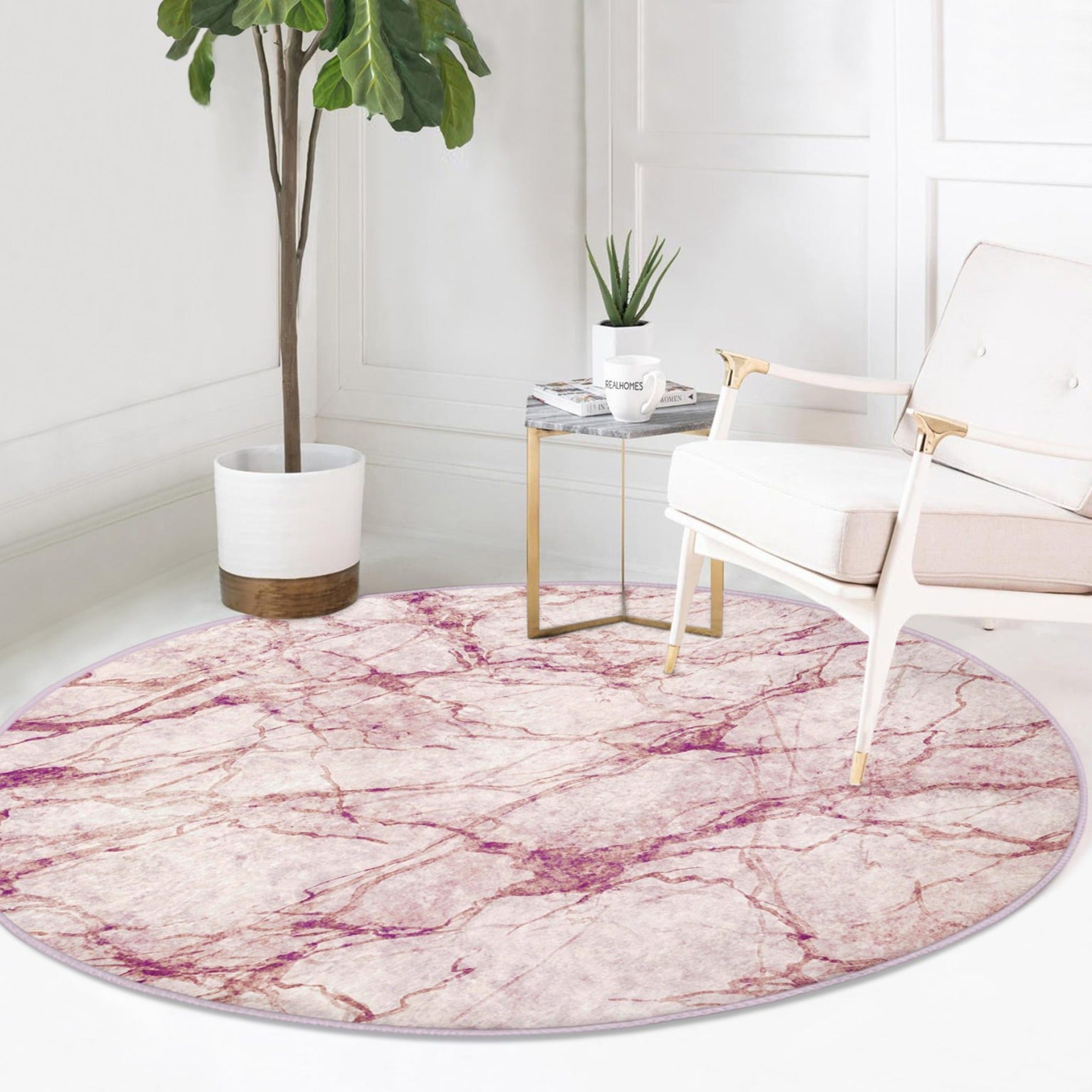 A stylish pink marble pattern round rug, perfect for home decor, showcasing a soft velvet texture and vibrant colors.