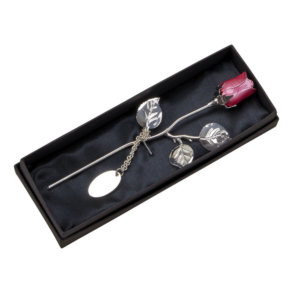 A beautiful 7.5-inch silver-plated rose with a pink epoxy flower, elegantly presented in a black satin-lined box.