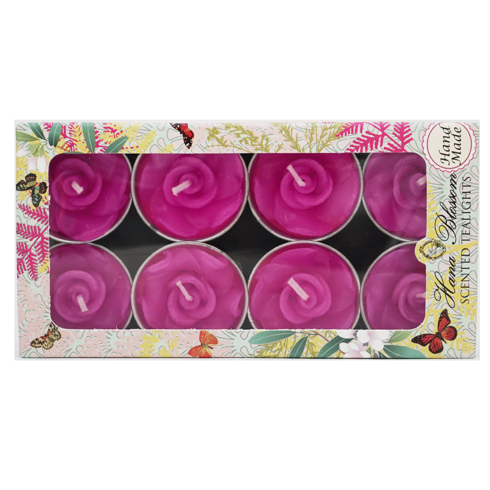 A set of eight pink rose scented tealights in a decorative botanic garden printed box, showcasing their elegant design and inviting fragrance.