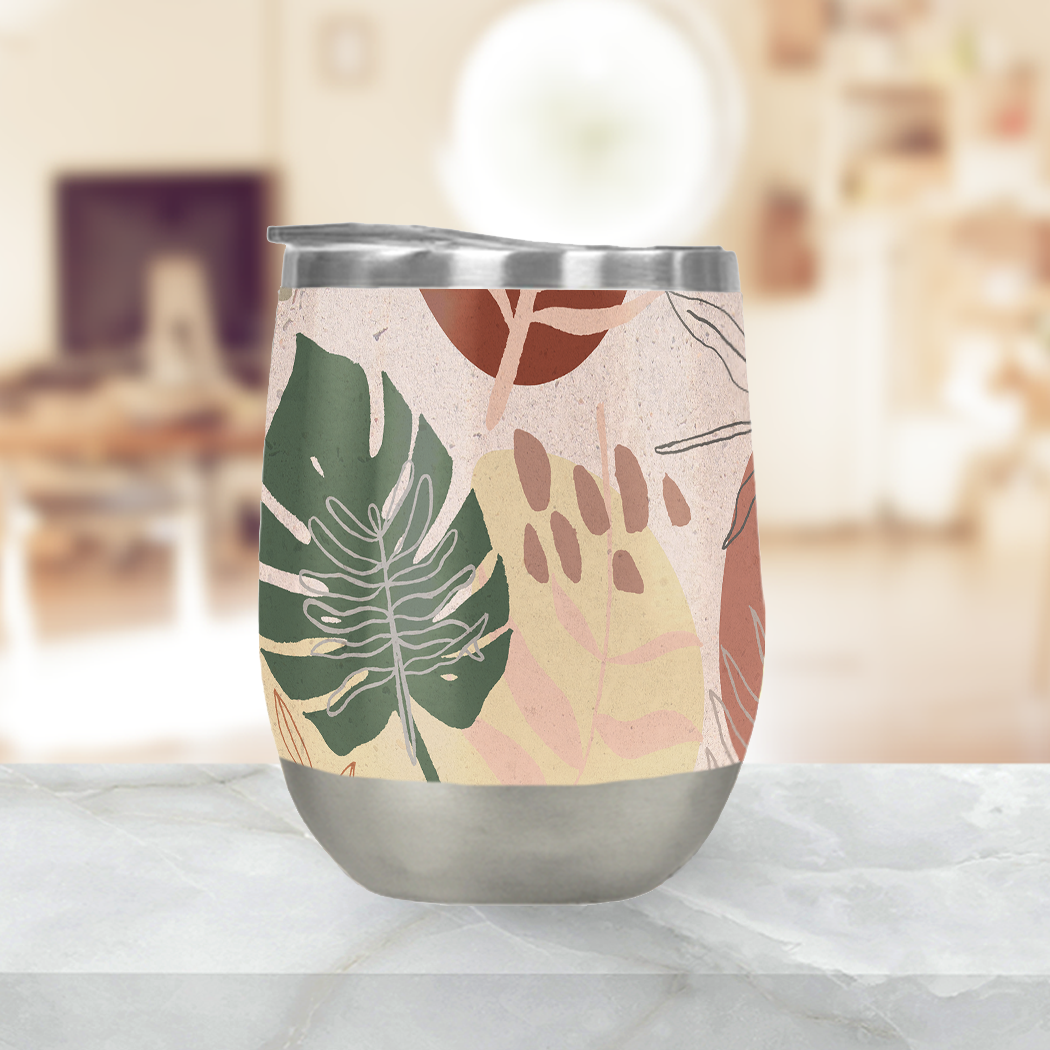 A stylish pink terracotta wine tumbler made of stainless steel, featuring a double-wall design and a plastic lid, perfect for outdoor use.