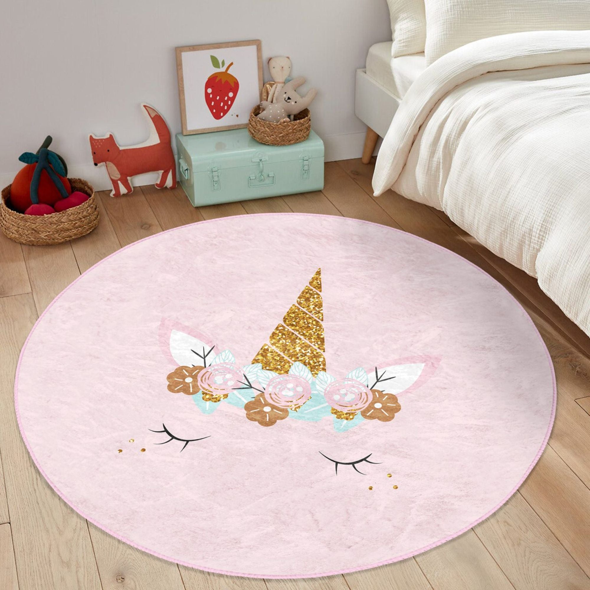 A soft pink unicorn baby room rug featuring a whimsical design, perfect for nurseries and playrooms.