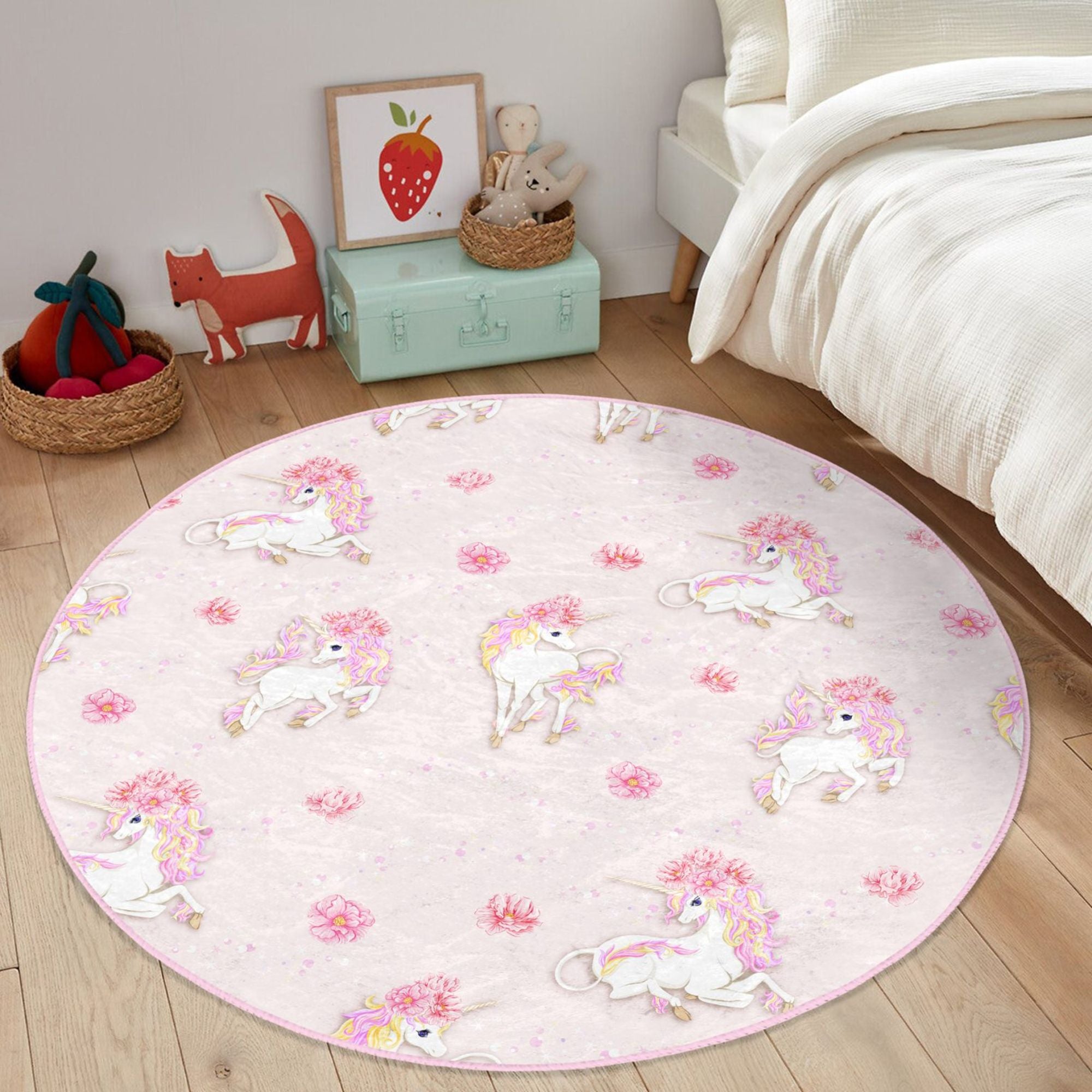 A vibrant pink rug featuring a whimsical unicorn pattern, perfect for a girl's room or nursery, made from soft and durable materials.