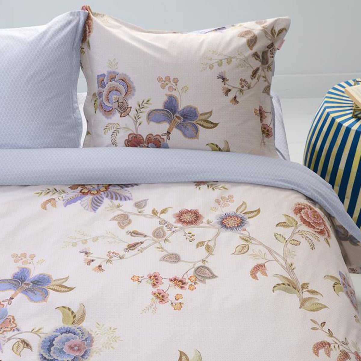 PIP Studio Cece Fiore White Cotton Quilt Cover Set featuring large floral illustrations and a luxurious design with Oxford border and colored piping.