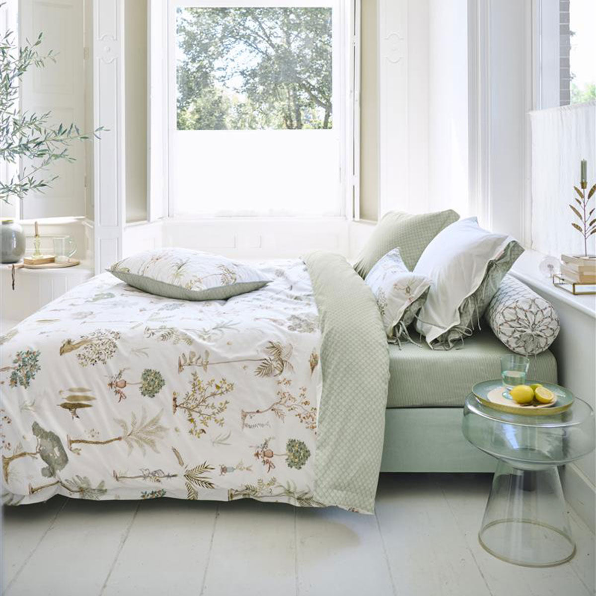 PIP Studio Giardini di Frutta White Cotton Quilt Cover Set featuring palm and fruit tree designs, with a luxurious stitched Oxford border.