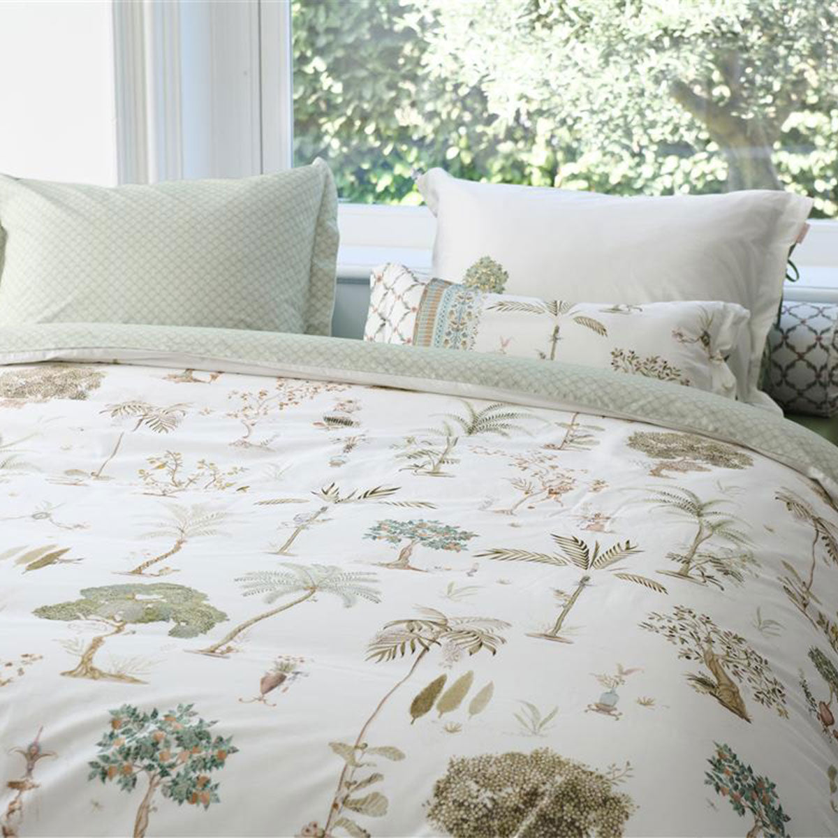 PIP Studio Giardini di Frutta White Cotton Quilt Cover Set featuring palm and fruit tree designs, with a luxurious stitched Oxford border.