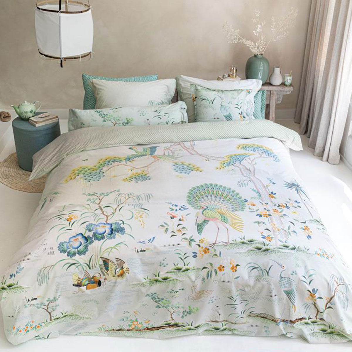 PIP Studio Japonica White Quilt Cover Set featuring floral landscape design with peacock and bird of paradise, made from luxurious 100% cotton.