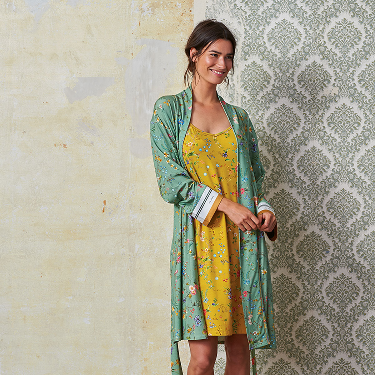 PIP Studio Nisha Petites Fleurs Green Kimono Bath Robe XL featuring vibrant floral patterns and yellow accents at the wrists.