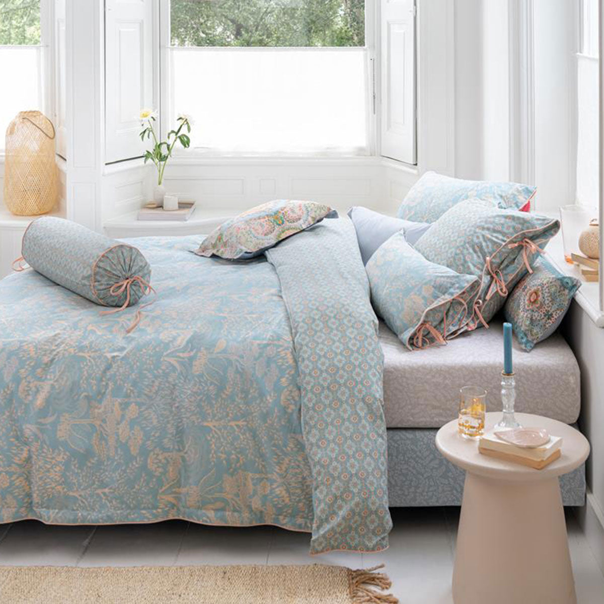 PIP Studio Origami Tree Light Blue Quilt Cover Set featuring intricate tree and bird patterns in vibrant colors.