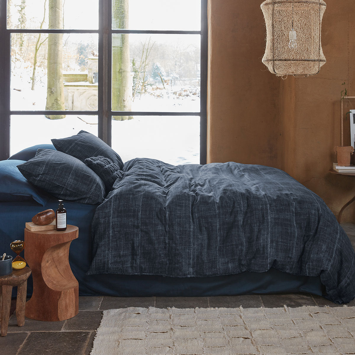 PIP Studio Vintage Indigo Dark Blue Cotton Quilt Cover Set featuring a jeans print design, perfect for a stylish bedroom.