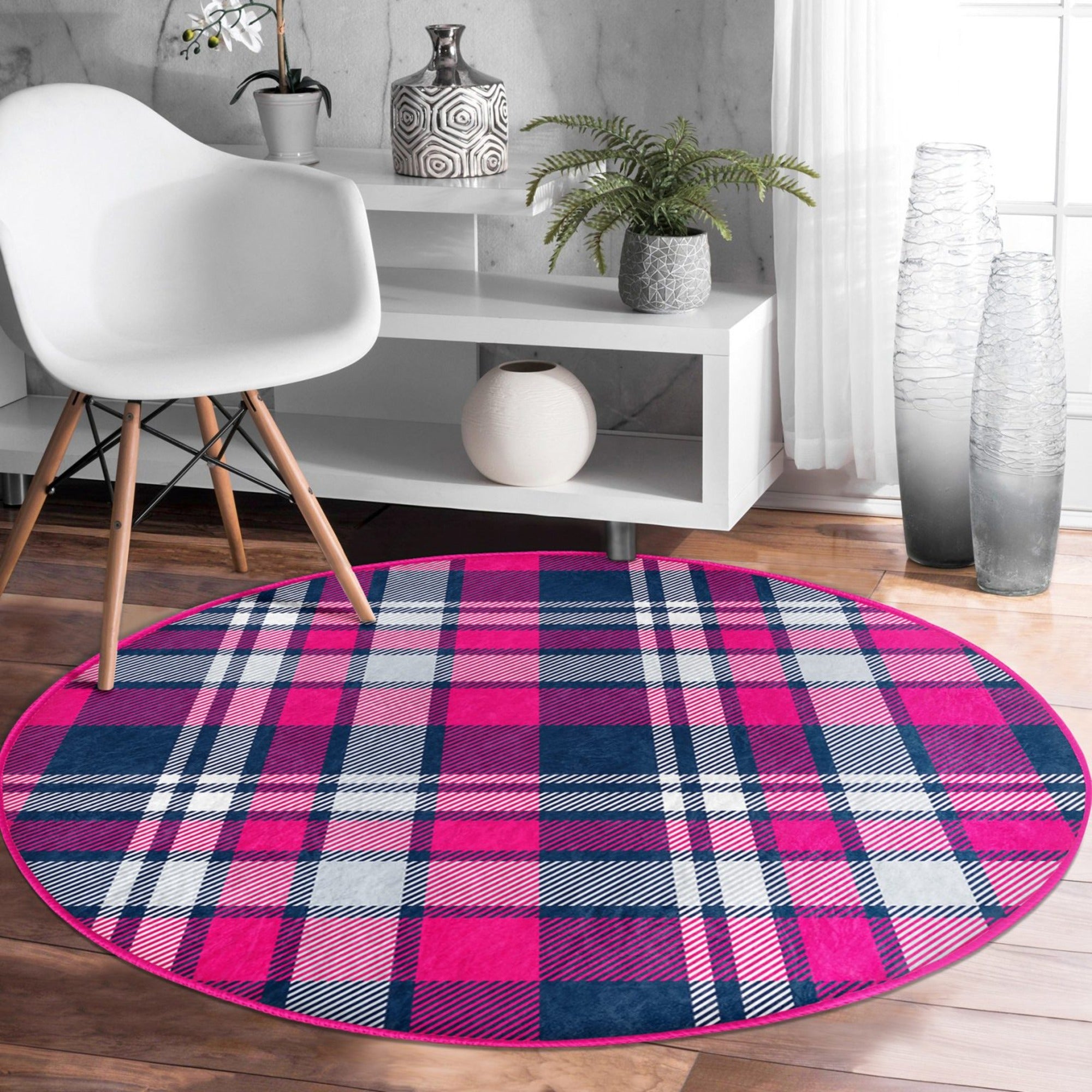 A beautifully designed plaid patterned round rug in various sizes, showcasing its soft velvet texture and vibrant colors, perfect for living room decor.