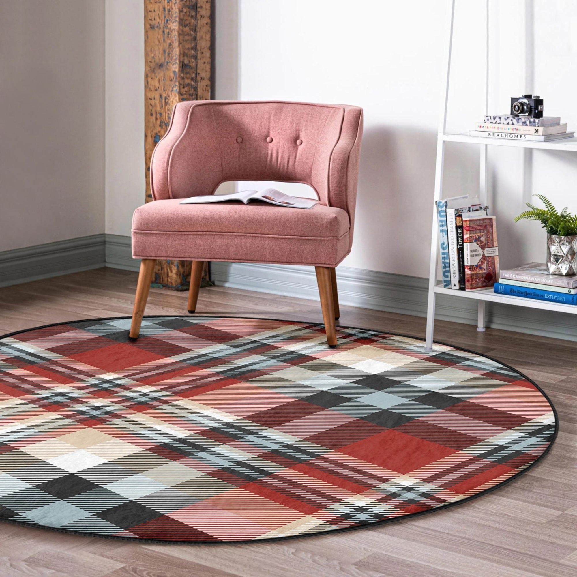 Plaid patterned round rug in a cozy living room setting, showcasing its soft velvet texture and non-slip backing.