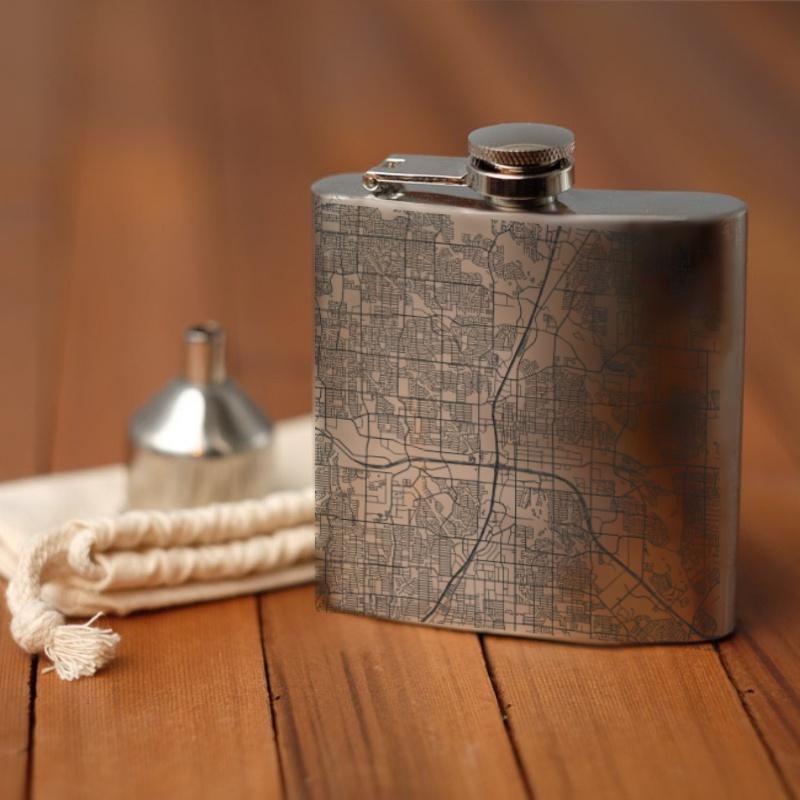 Plano, Texas map engraved on a sleek 6oz hip flask with a funnel and canvas bag.