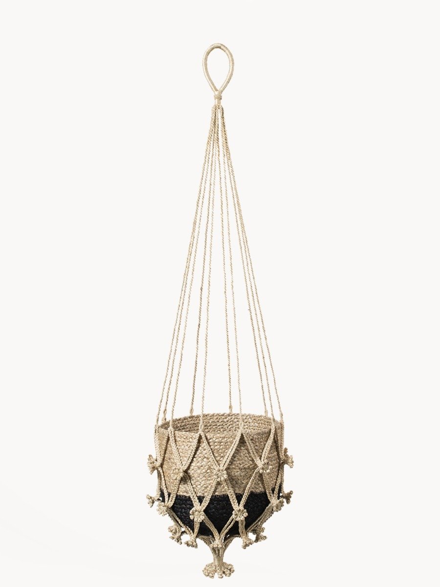 Shuly Plant Hanger made from braided jute with a floral pattern, showcasing its unique design and natural color.