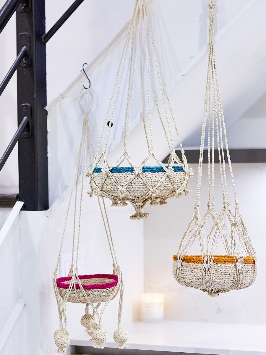 Shuly Plant Hanger made from braided jute with a floral pattern, showcasing its unique design and natural color.