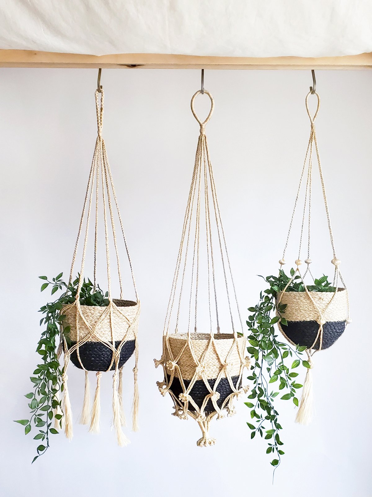 Shuly Plant Hanger made from braided jute with a floral pattern, showcasing its unique design and natural color.