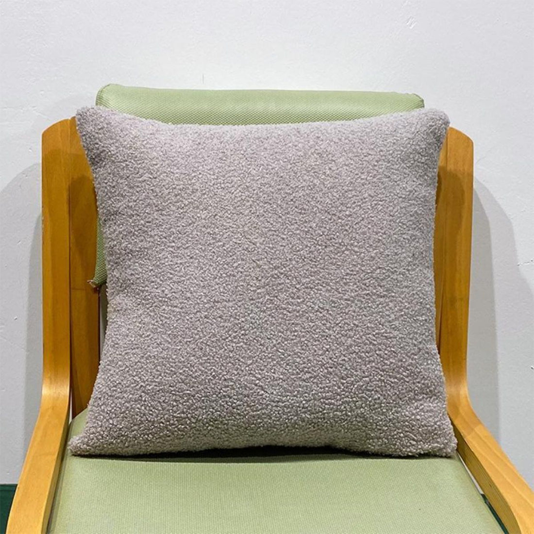 A plush sofa cushion cover in vibrant colors, enhancing the living room decor with comfort and style.