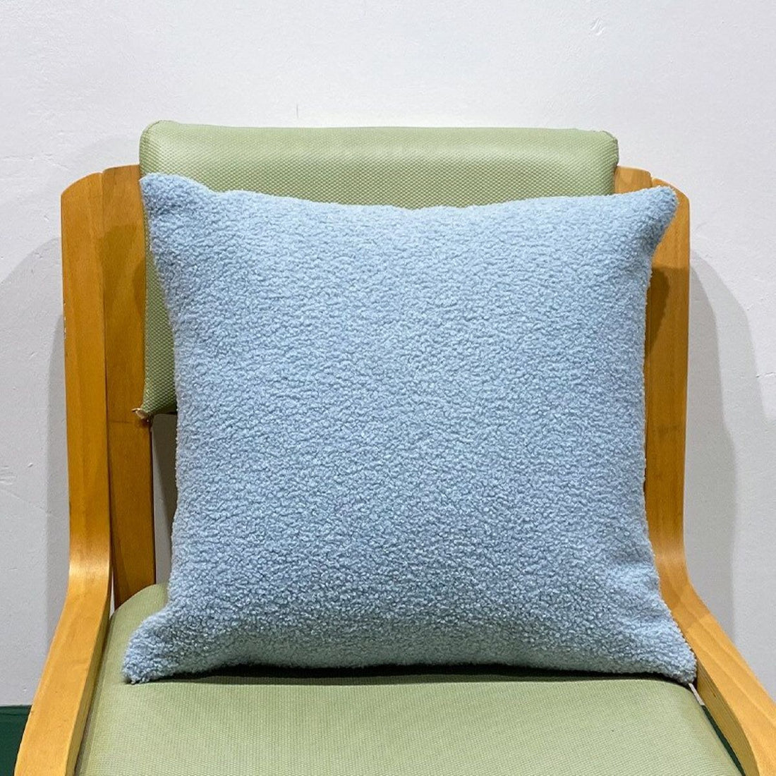 A plush sofa cushion cover in vibrant colors, enhancing the living room decor with comfort and style.