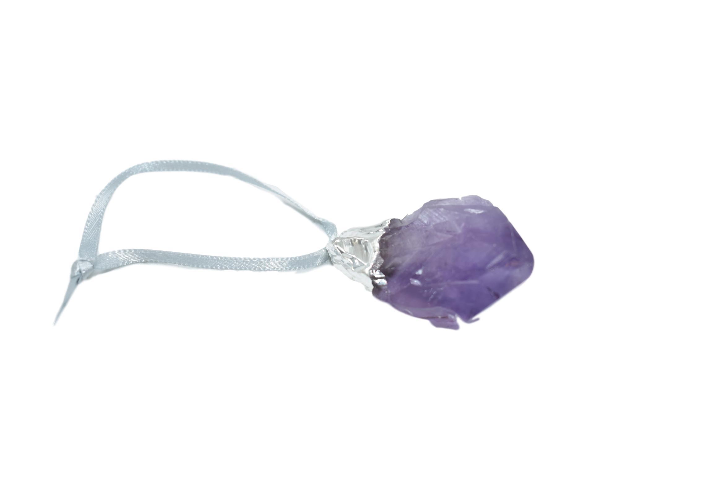 A collection of crystal point ornaments in amethyst, white quartz, and citrine, featuring elegant silver electroplating and matching ribbons.