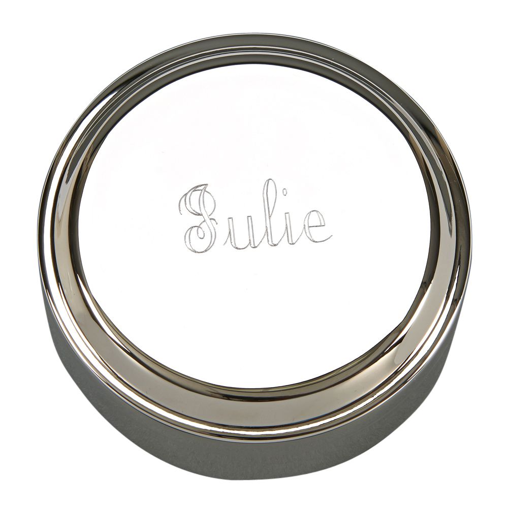 A polished round box with a shiny nickel-plated exterior and dark blue flocked interior, perfect for gifts and keepsakes.