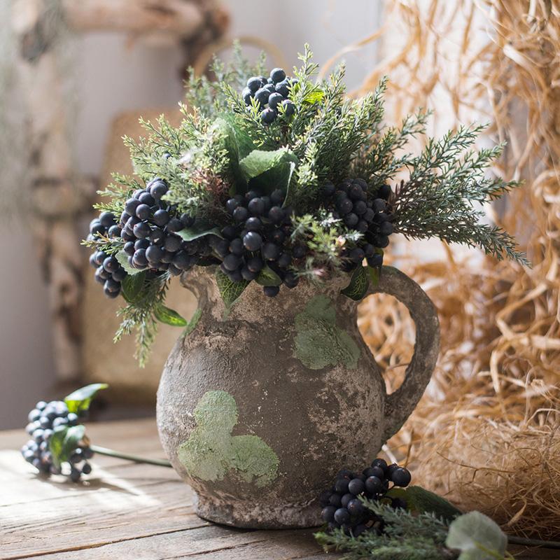 Pompeii Cement Floral Jar in gray and green colors, showcasing a stylish design perfect for decorative use.