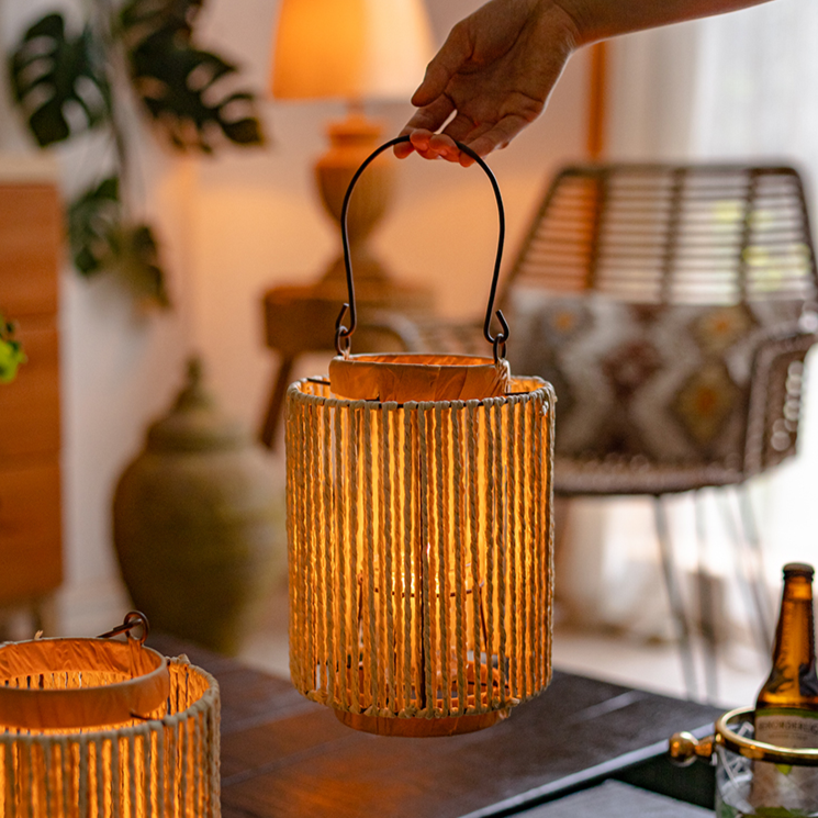 Portable Lantern Candle Holder in natural khaki color, featuring a hemp body and metal handle, perfect for indoor and outdoor decor.