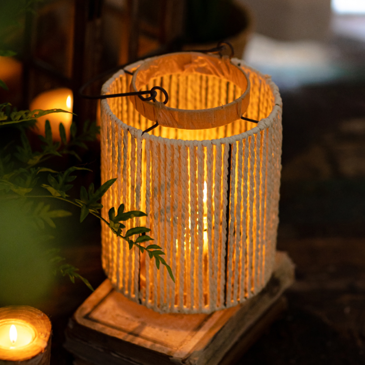 Portable Lantern Candle Holder in natural khaki color, featuring a hemp body and metal handle, perfect for indoor and outdoor decor.