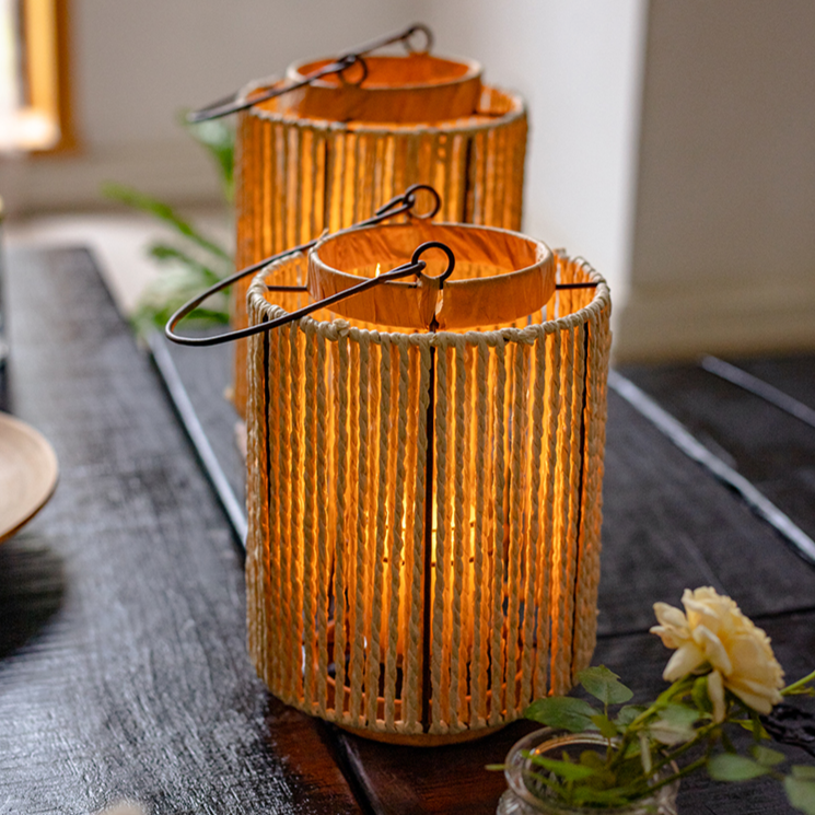 Portable Lantern Candle Holder in natural khaki color, featuring a hemp body and metal handle, perfect for indoor and outdoor decor.