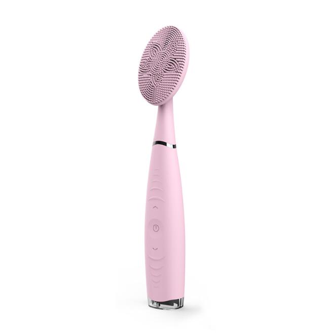 Portable New Facial Cleansing Brush with silicone bristles for gentle facial cleansing.