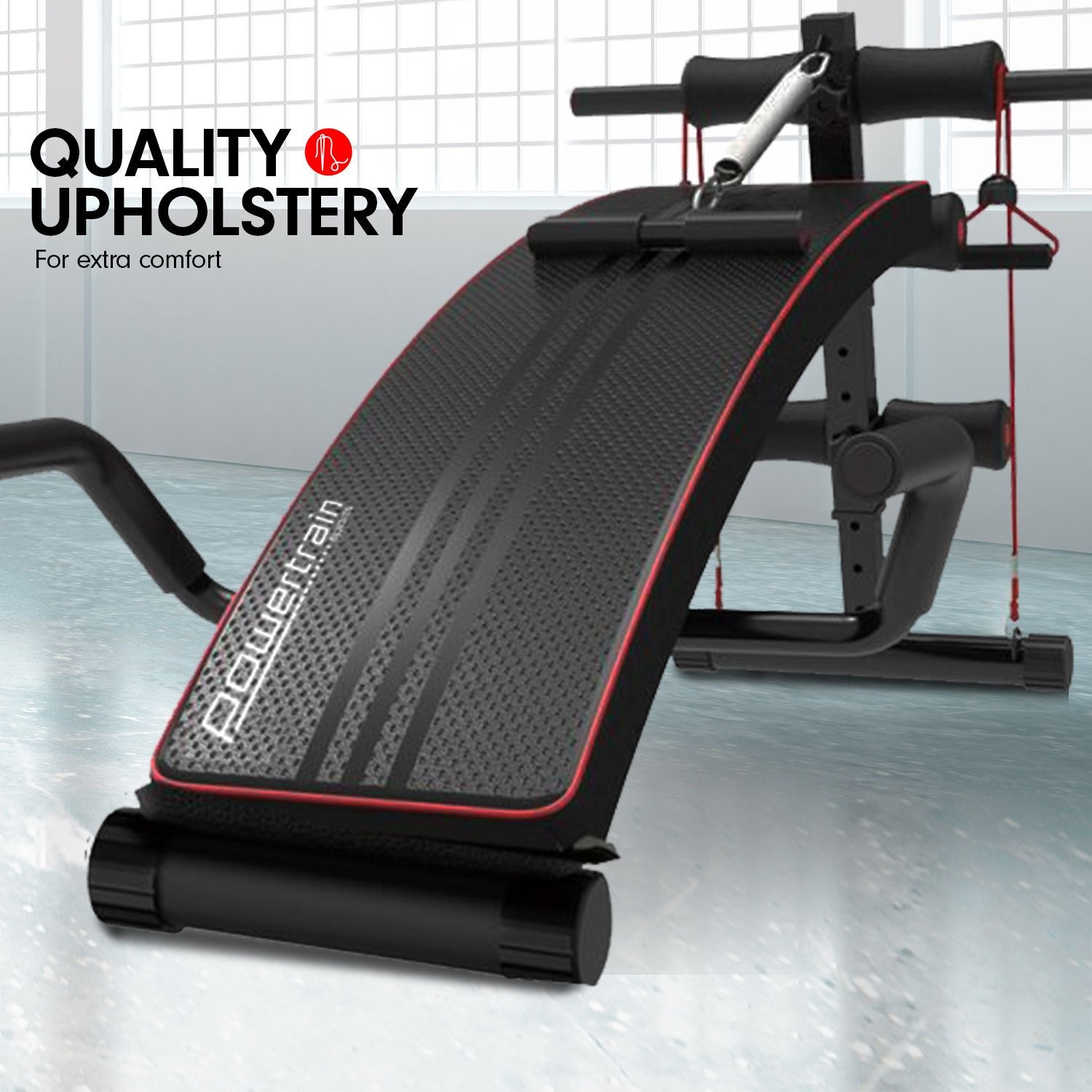 Powertrain Incline Sit-Up Bench with resistance bands and rowing bar, featuring a sleek black and red design, padded foam rollers, and adjustable incline.