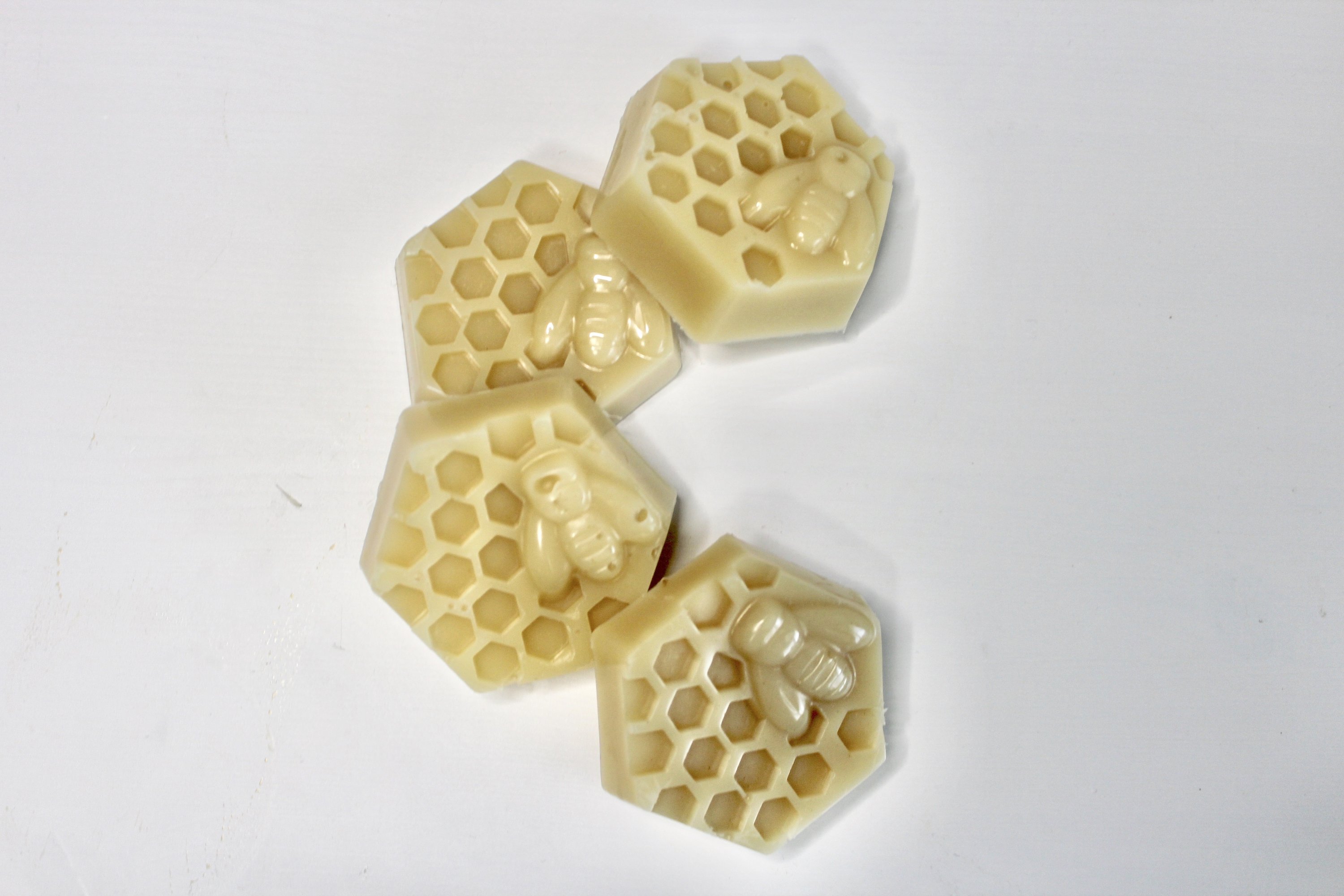 A Pre-mixed Wax Bar made of beeswax, pine resin, and jojoba oil, ideal for rejuvenating beeswax wraps or creating new ones.