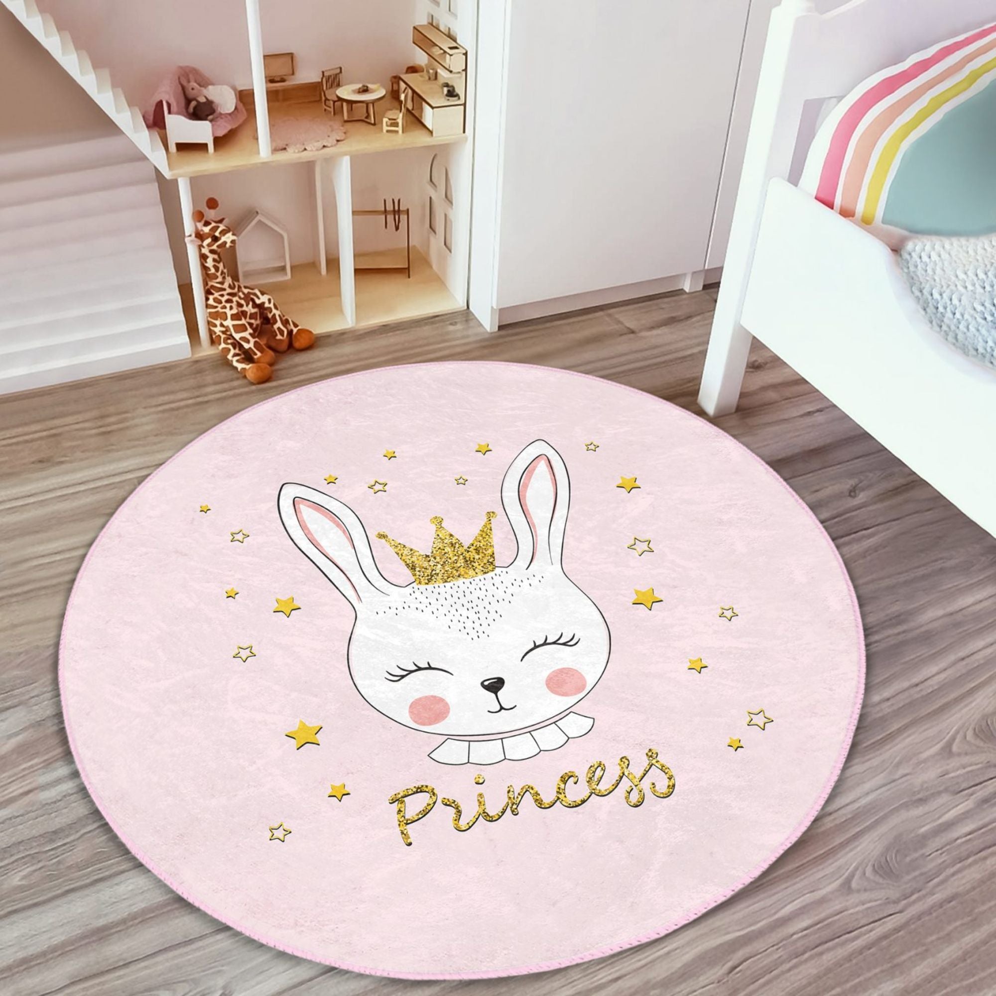 A pink washable rug featuring a cute princess rabbit pattern, perfect for kids' rooms, showcasing vibrant colors and soft texture.