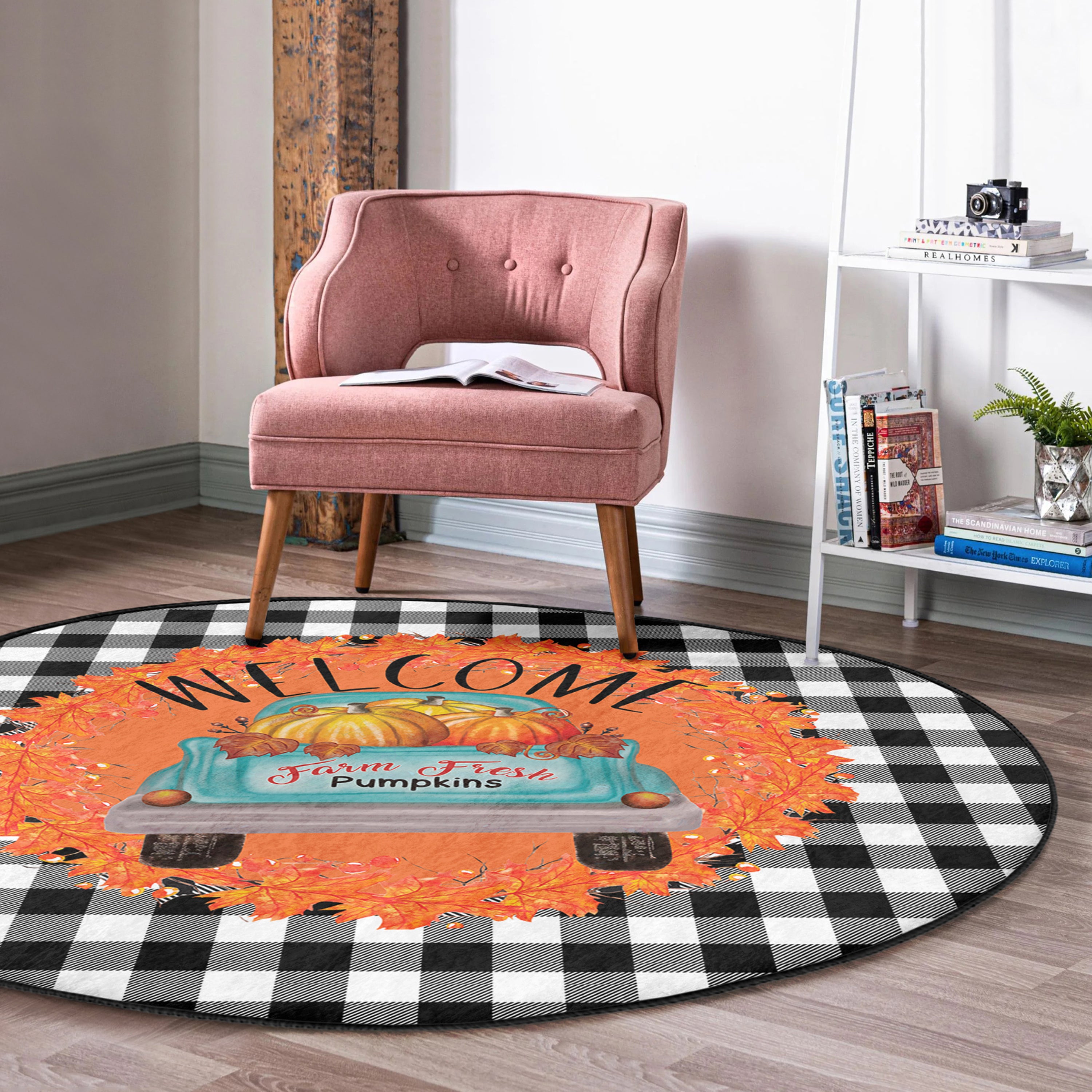 A vibrant round rug featuring a pumpkin farm truck design, showcasing bright colors and intricate details, perfect for fall decor.