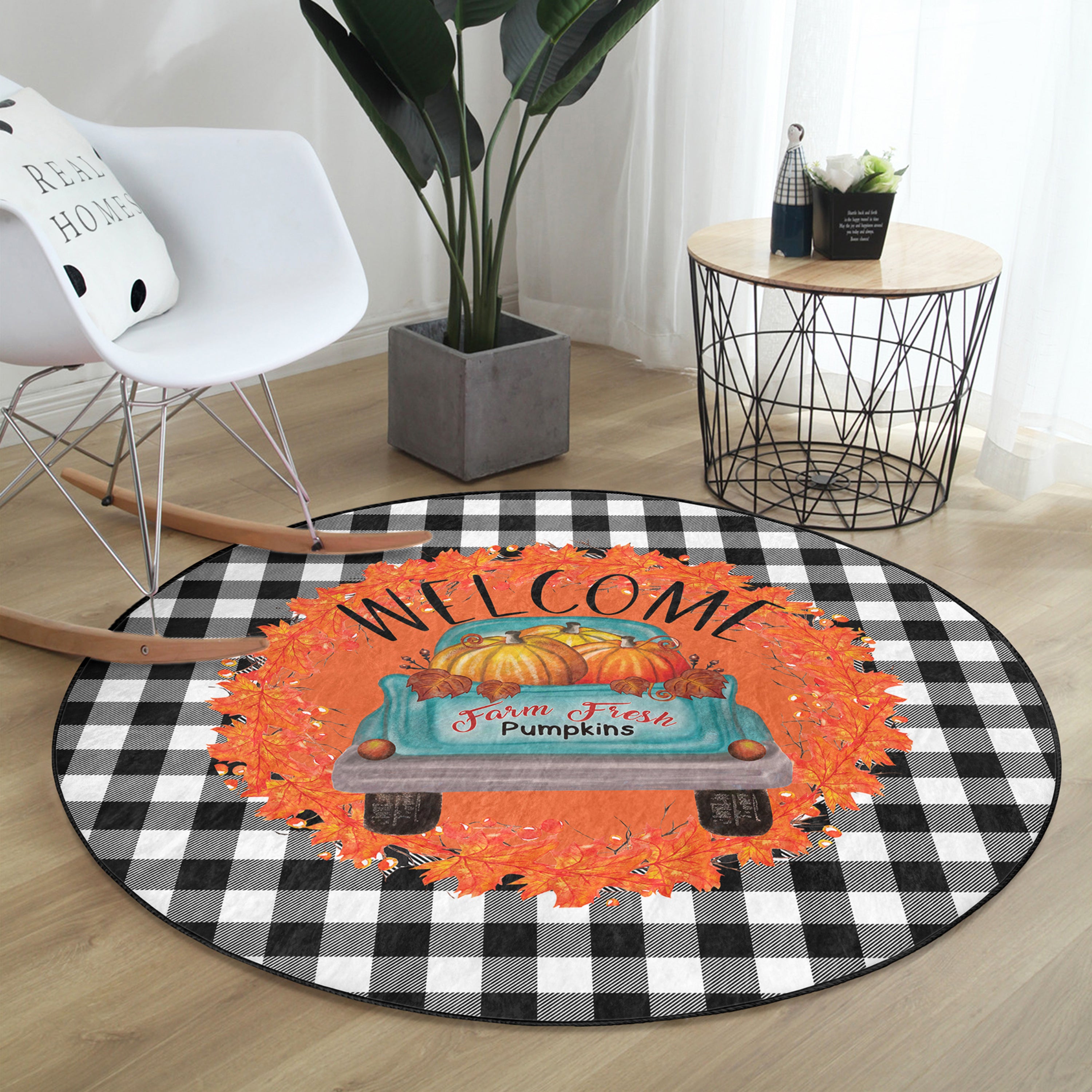 A vibrant round rug featuring a pumpkin farm truck design, showcasing bright colors and intricate details, perfect for fall decor.