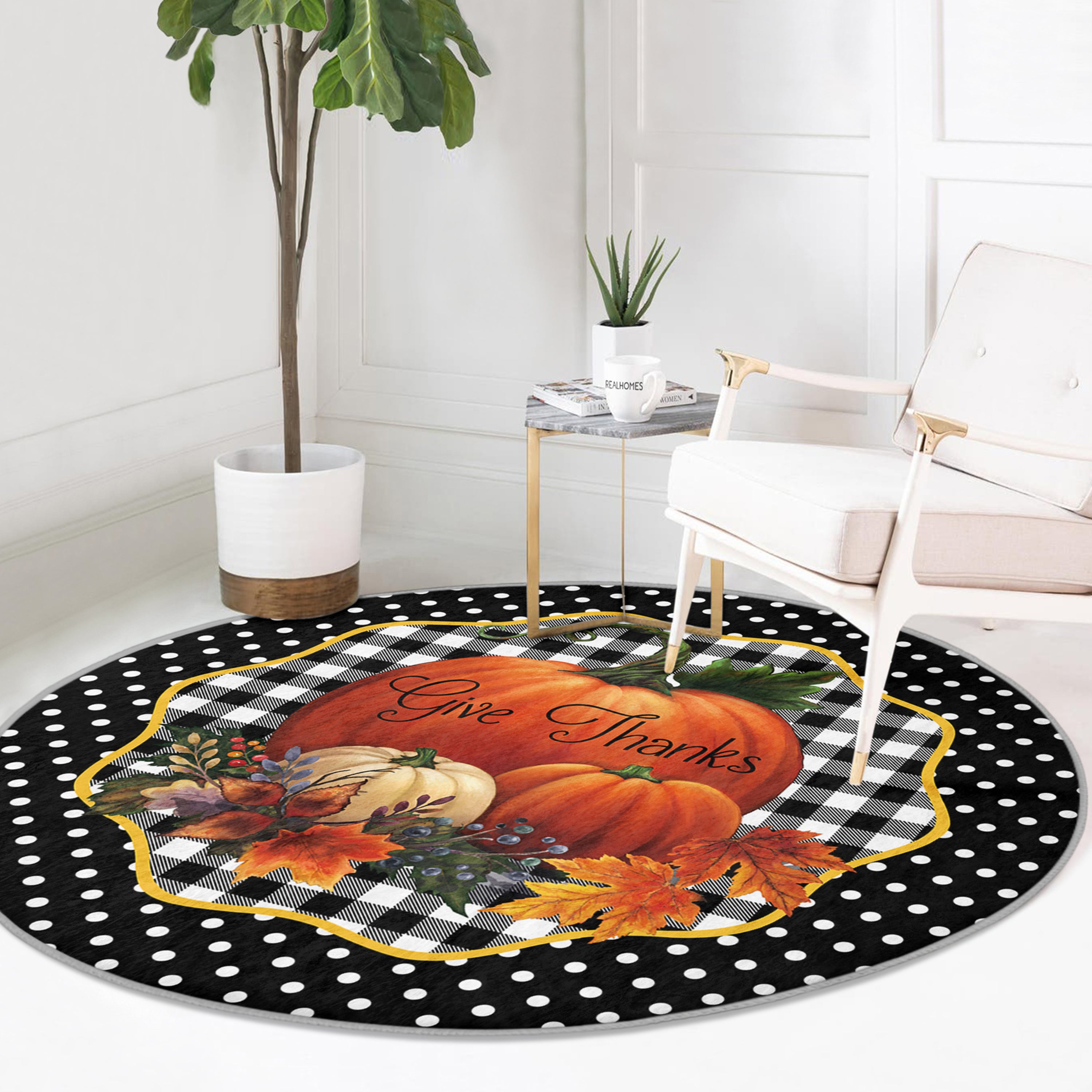 A round rug featuring a vibrant pumpkin pattern, made of soft velvet fabric, perfect for living room decor.