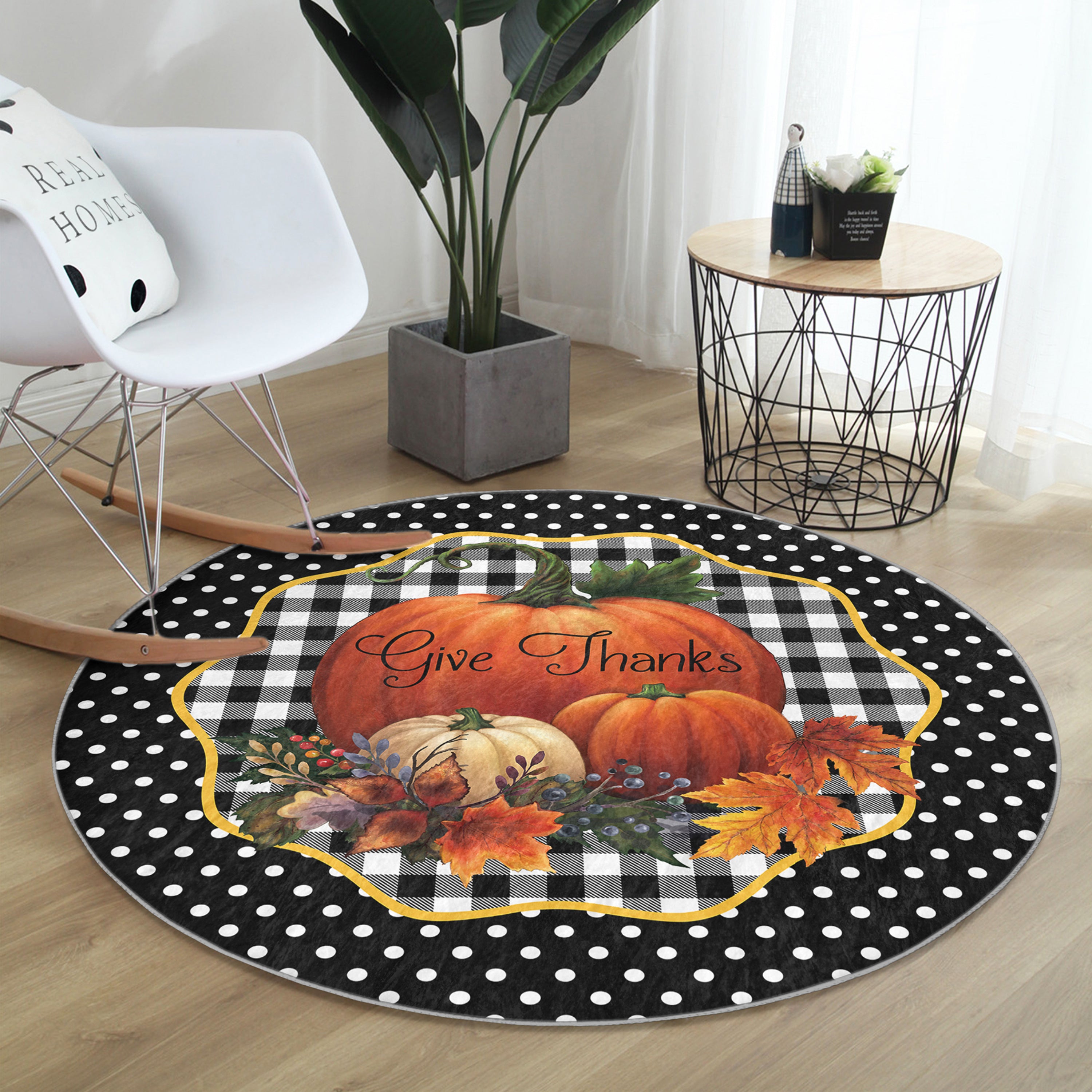 A round rug featuring a vibrant pumpkin pattern, made of soft velvet fabric, perfect for living room decor.