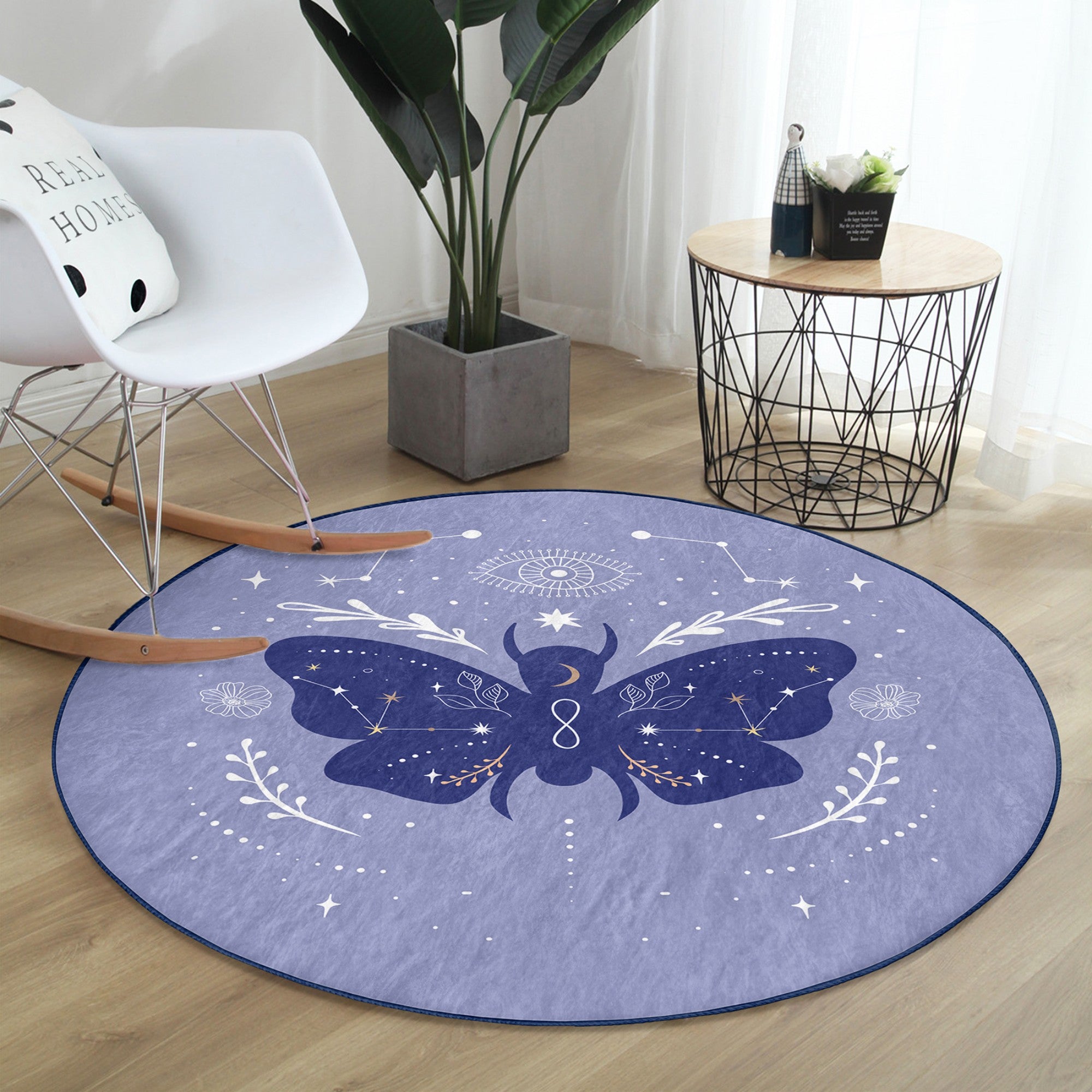 A round rug featuring a vibrant purple butterfly pattern, made of soft velvet fabric, perfect for boho home decor.