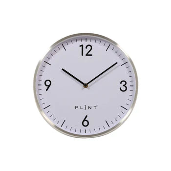 Elegant Quarter Wall Clock made of metal and glass, featuring a silent movement and a modern design, perfect for home or office decor.