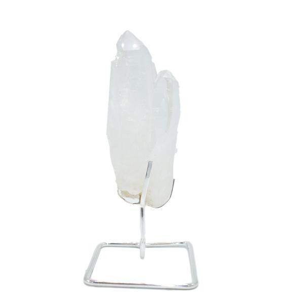 A beautiful quartz point displayed on a sturdy wire stand, available in gold and silver finishes, enhancing home decor.