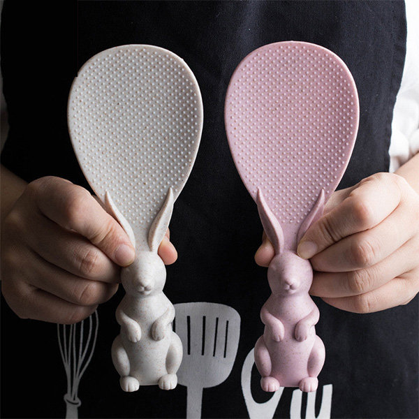 Two bunny-shaped rice paddles.