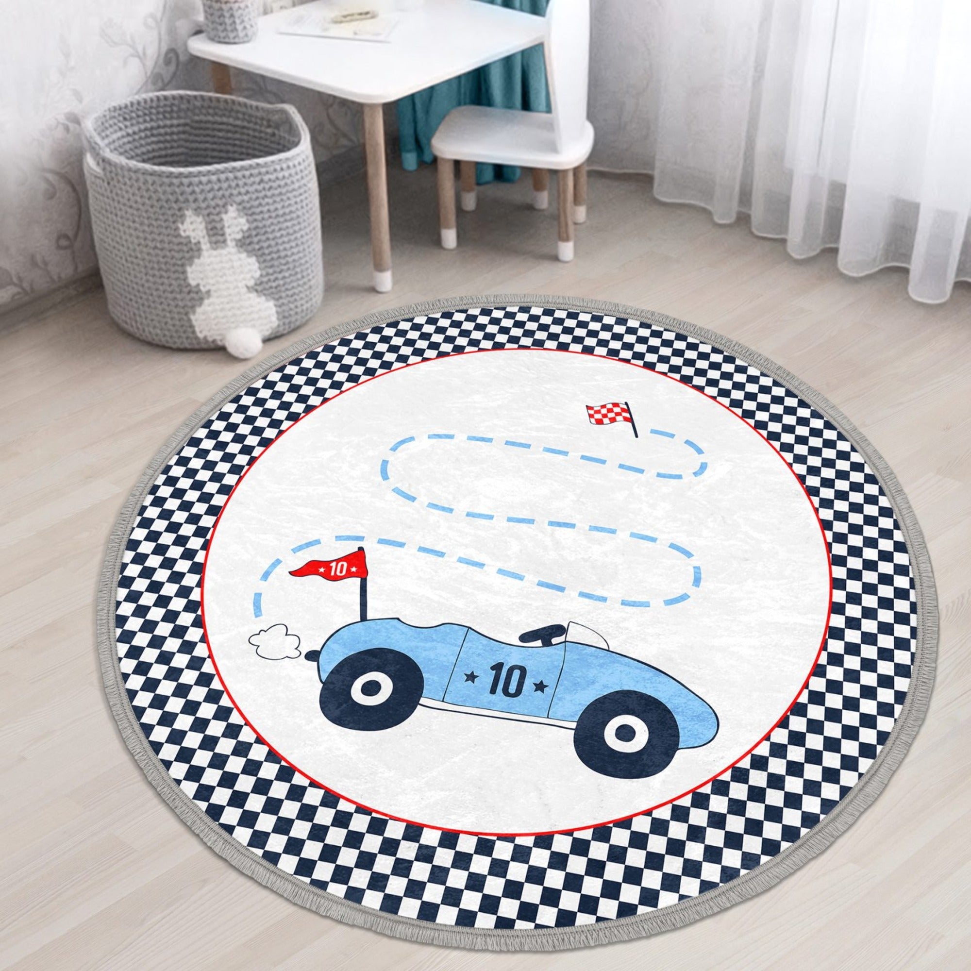 Colorful race car printed round area rug for kids' room, featuring a soft velvet texture and nonslip backing.