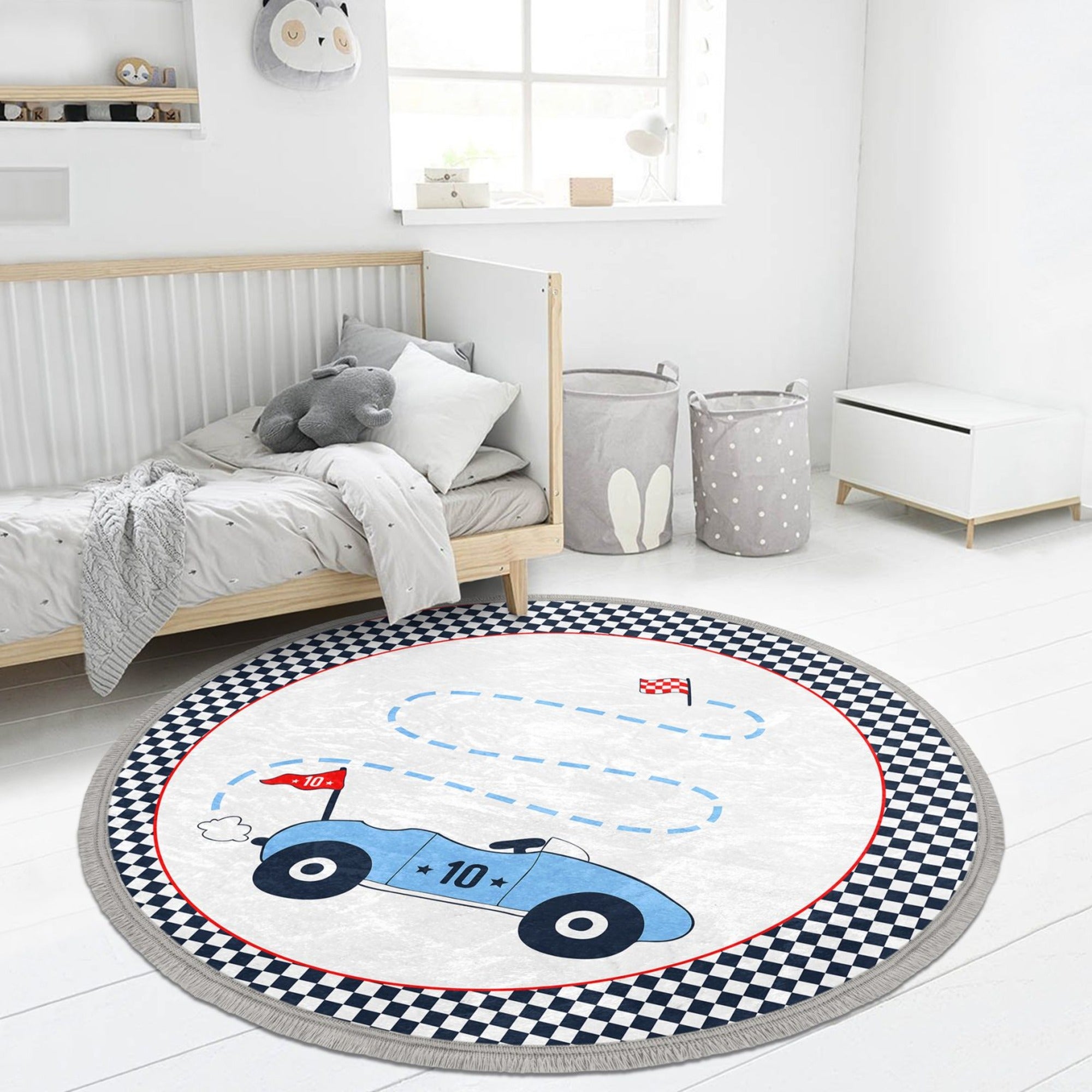 Colorful race car printed round area rug for kids' room, featuring a soft velvet texture and nonslip backing.