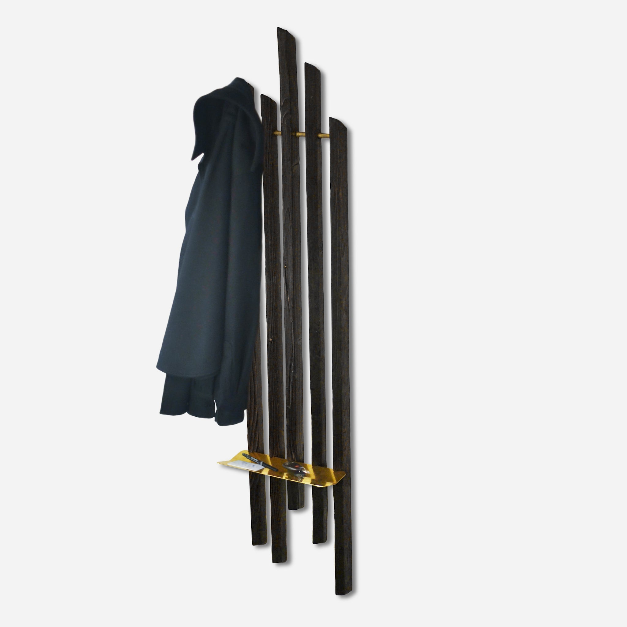 Rack On coat rack featuring hooks and a brass tray, made from reclaimed wood with a torched black finish.