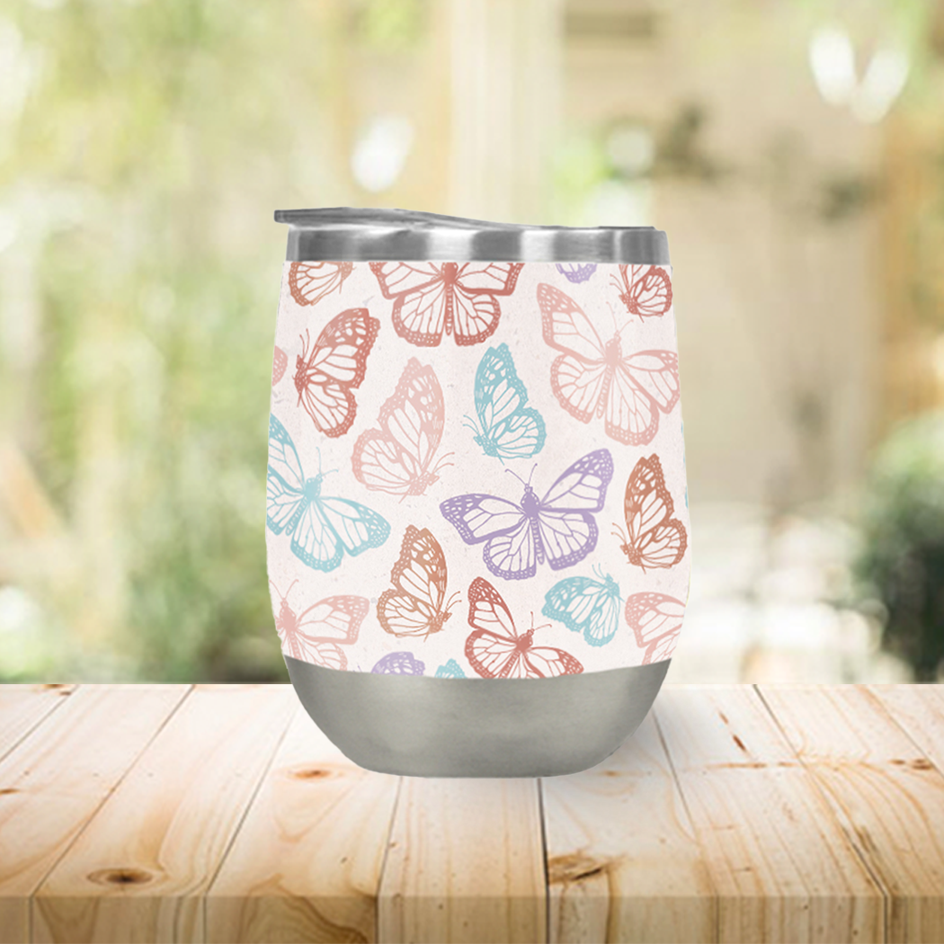 Colorful Rainbow Butterfly Wine Tumbler with double-wall insulation, perfect for outdoor use.